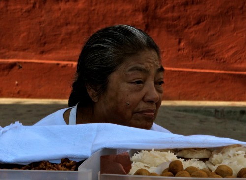 Woman dulce vendor outside Sangre de Cristo