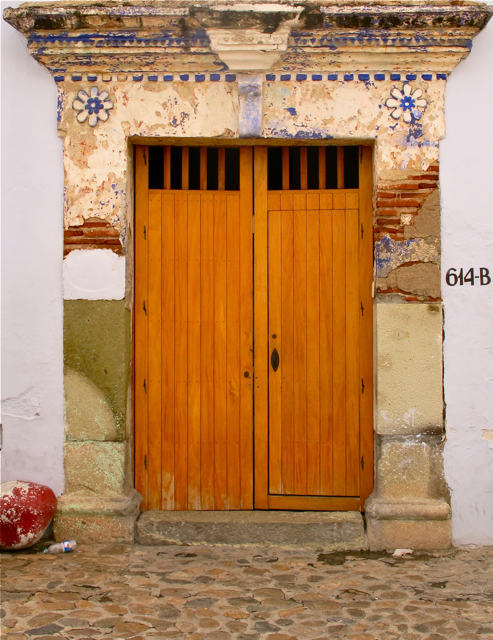 Doorway on a cobblestone street.
