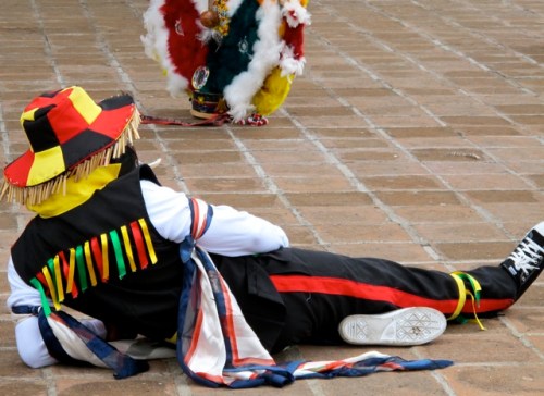Subalterno laying down on the plaza