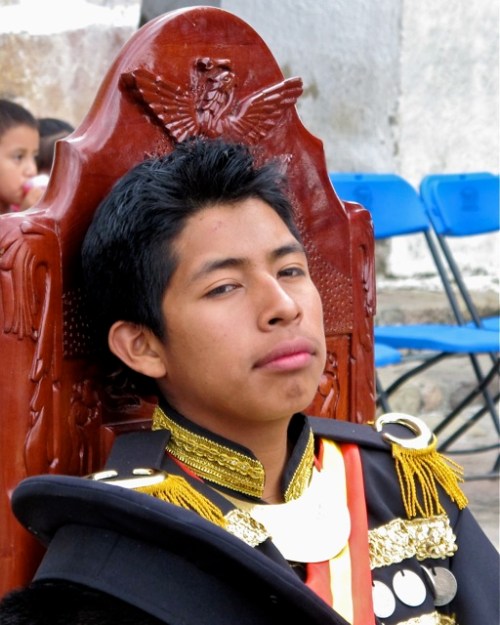 Cortes resting on his throne.