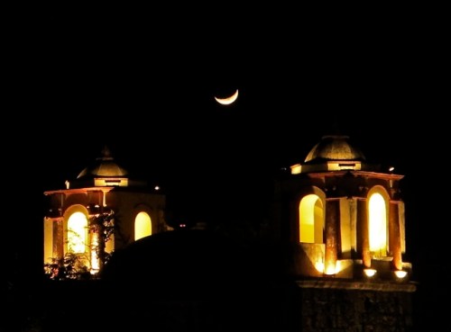 Crescent moon between the bell towers of San Jose church, in Oaxaca
