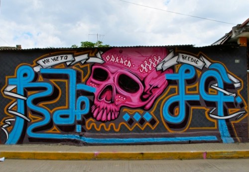 Wall mural: magenta skull with writing: Mr. Weto; Oaxaca; Reedie