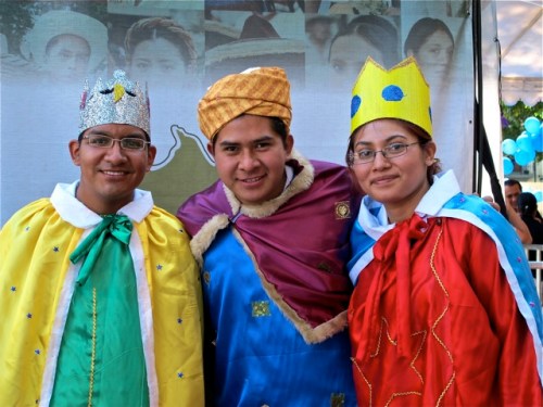 Three teenagers (2 boys and 1 girl) dressed as the Three King.