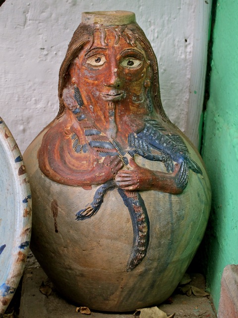 Vase in the shape of a woman's face and rounded body
