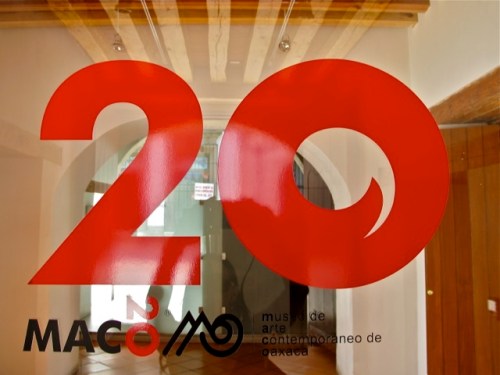 Large red 20 painted on window