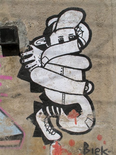 IMG_2223 Black and white wall art of boy with cap wrapped in arms