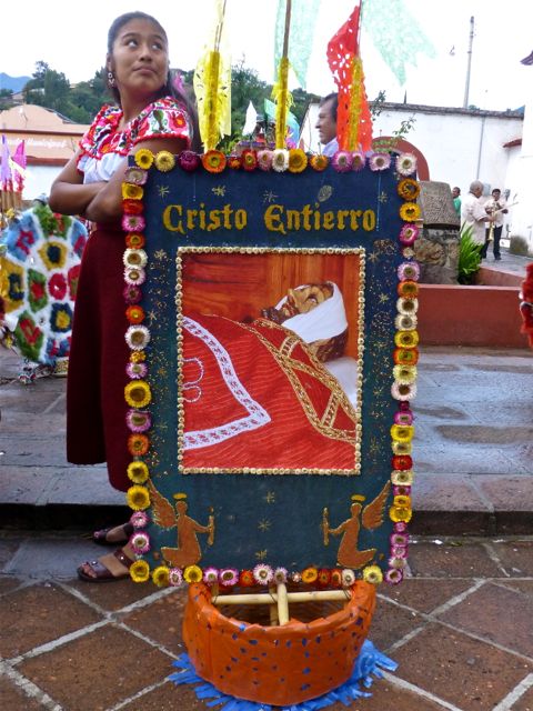 Decorated canasta with image of bandaged head of Jesus.