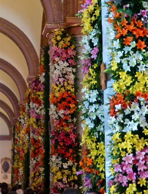 Pillars covered in multicolored lilies