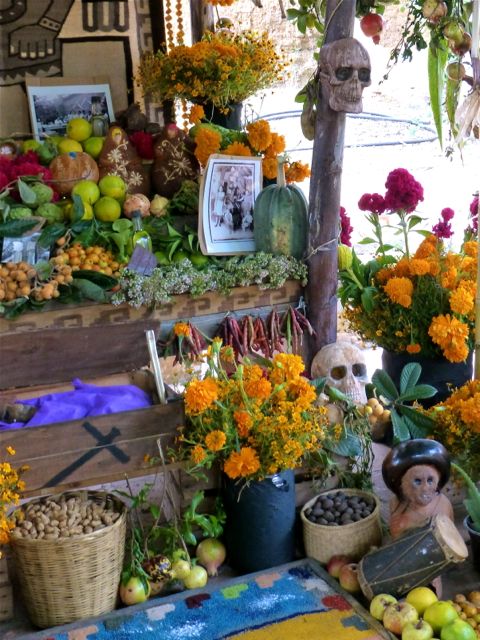 Marigolds, photos, fruit, vegetables, skulls, drum, baskets of nuts