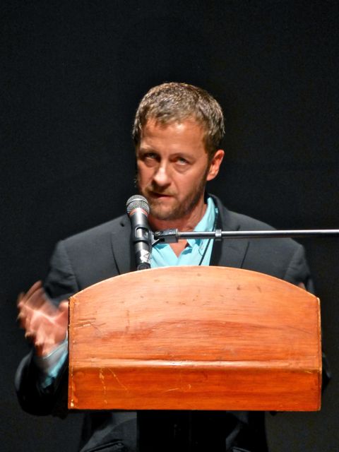 Ramiz Adeeb Azar standing at podium