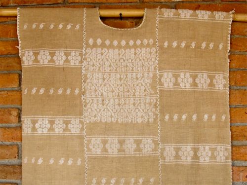 Embroidery detail of huipil made of coyuche