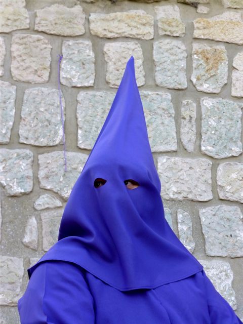 Purple hooded penitent