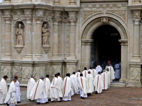 Procession of priests entering the Basilica