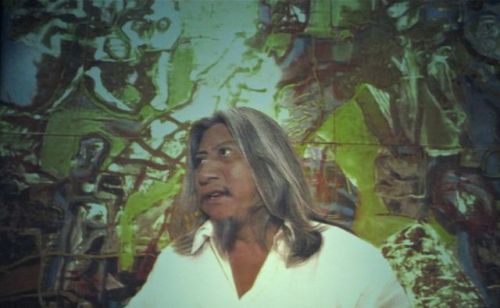 Image of Alejandro Santiago projected on screen at Homage