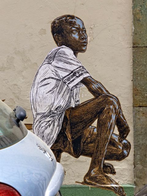 Wall art of boy sitting