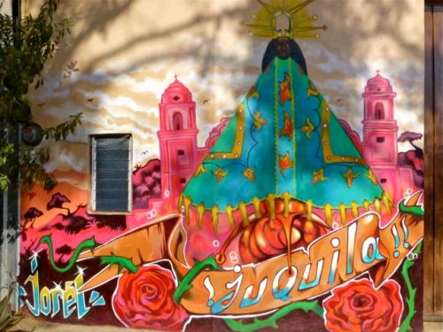 La Virgen de Juquila painted on side of building