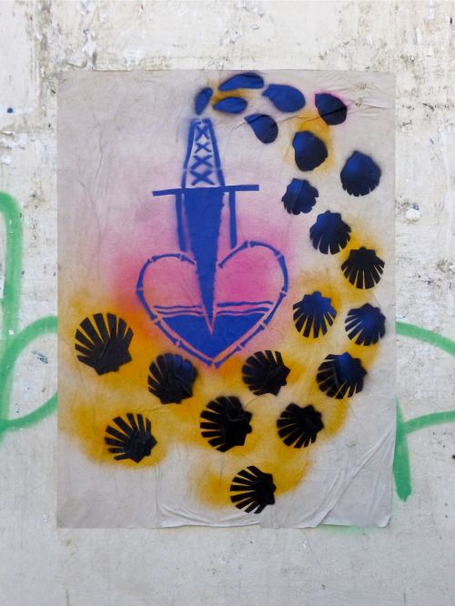 Poster of oil rig spewing oil from on top of a heart