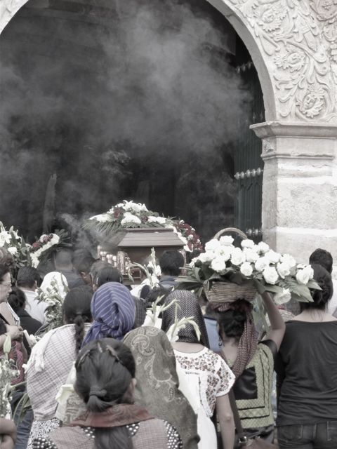 Casket being carried into church