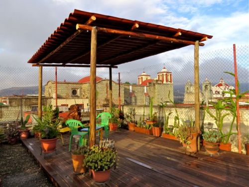 Lamina & wood shade structure on wooden deck