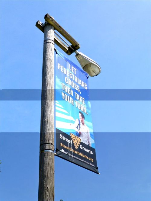 "Let pedestrians cross, then take your turn"