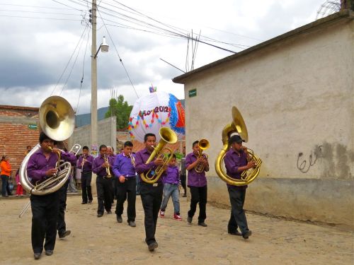 Banda marching down street