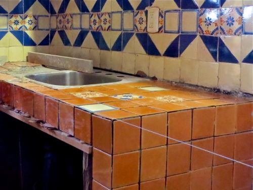 Russet orange tile on counter