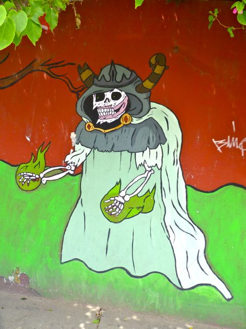 Skeleton in robes painted on wall