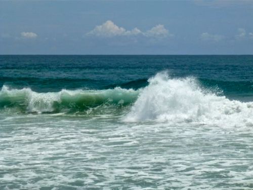 Pacific Ocean waves crashing onto the beach San Agustinillo, Oaxaca.