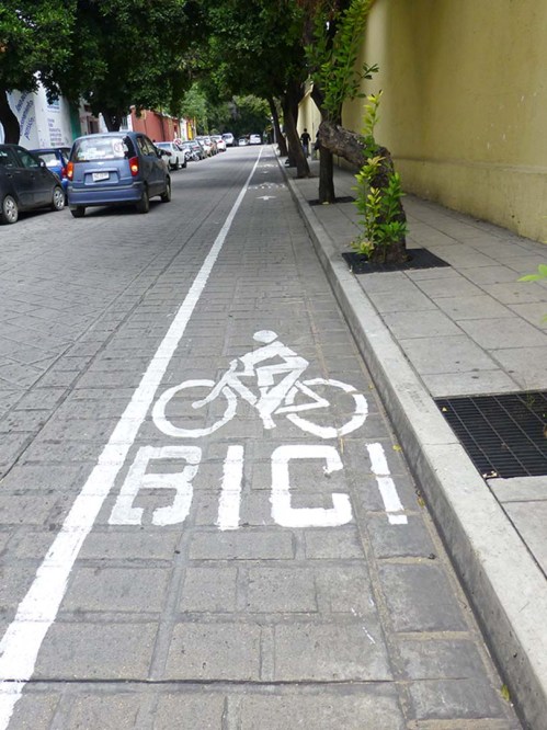 Bike lane:  "BICI" spelled out with line drawing of a bike