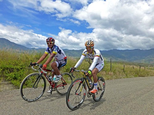 2 guys in spandex on country road