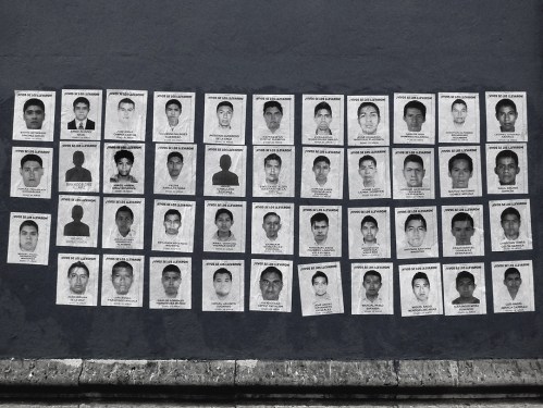 Photos of the 43 students pasted on wall